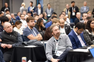 Audience watching a presentation.